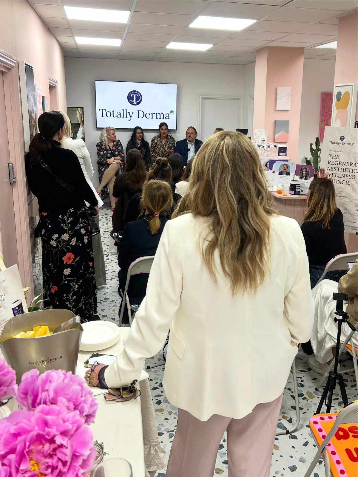 Audience listening at the Totally Derma® RAW Council