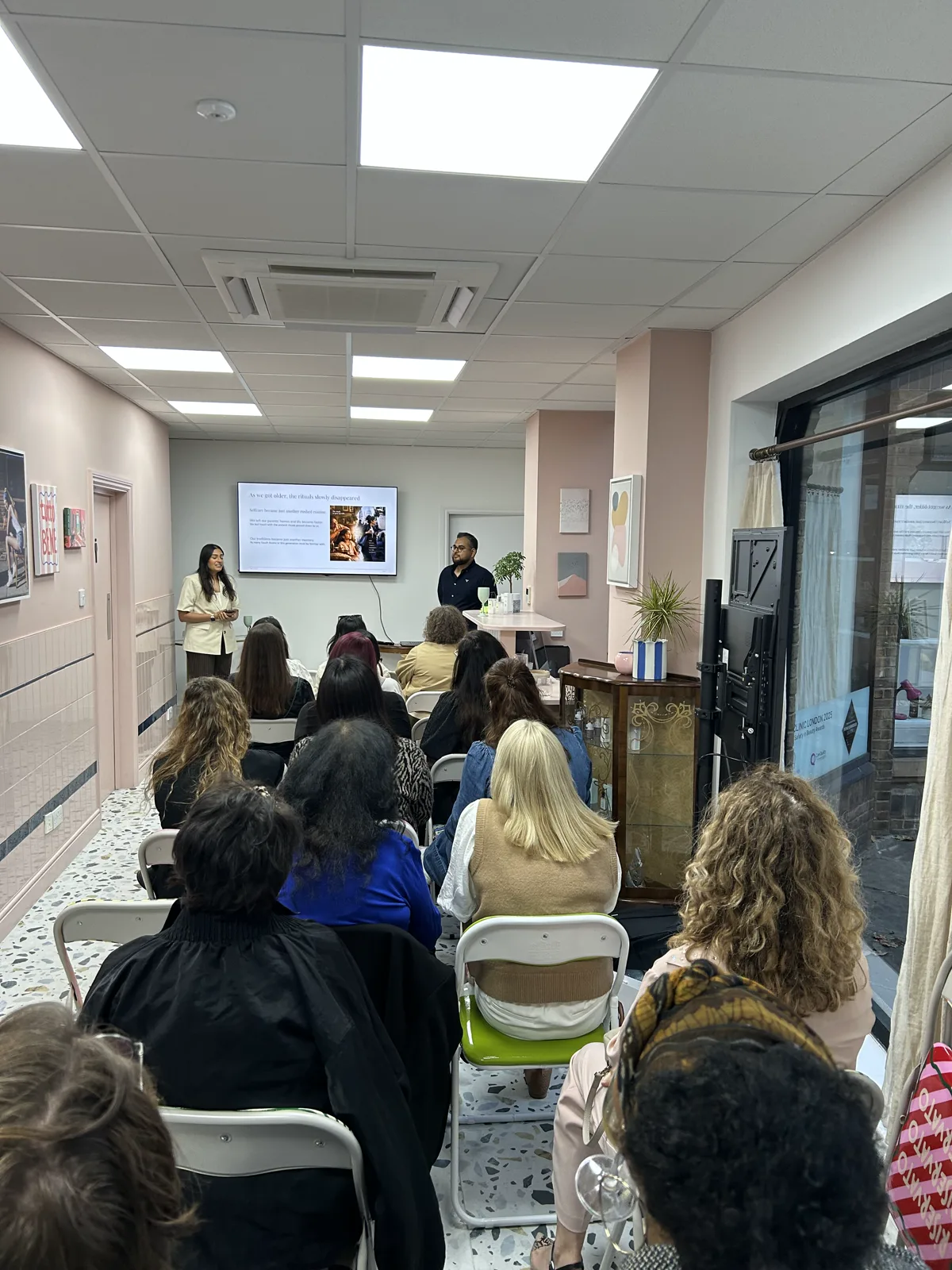 Guests listening during An Evening of Ritual, Wellness & Connection